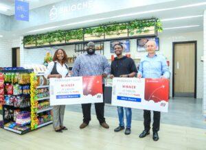 Award of the air tickets to the winners at Brioche Karen by RUBiS Energy Group Managing Director and CEO East Africa, Mr. Jean-Christian Bergeron